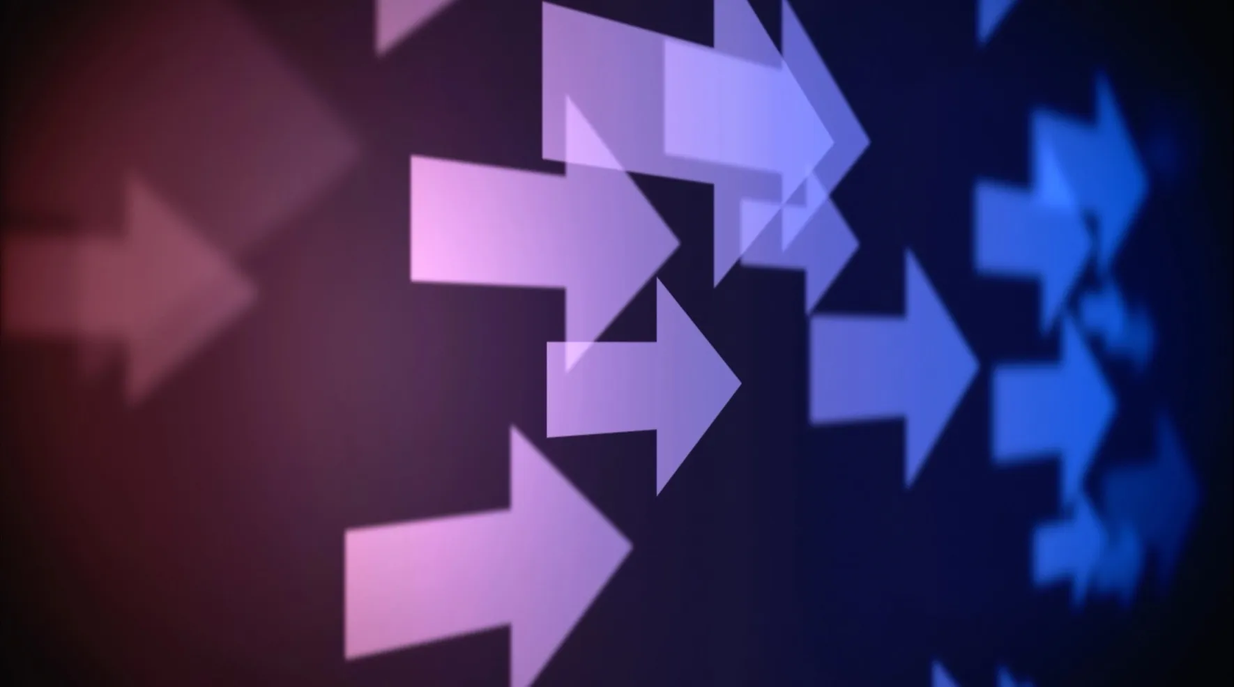 Translucent arrows pointing to the right, glowing purple and blue in the dark