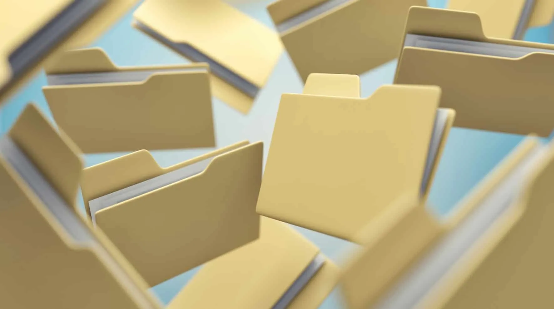 Scattered yellow folder icons in 3D