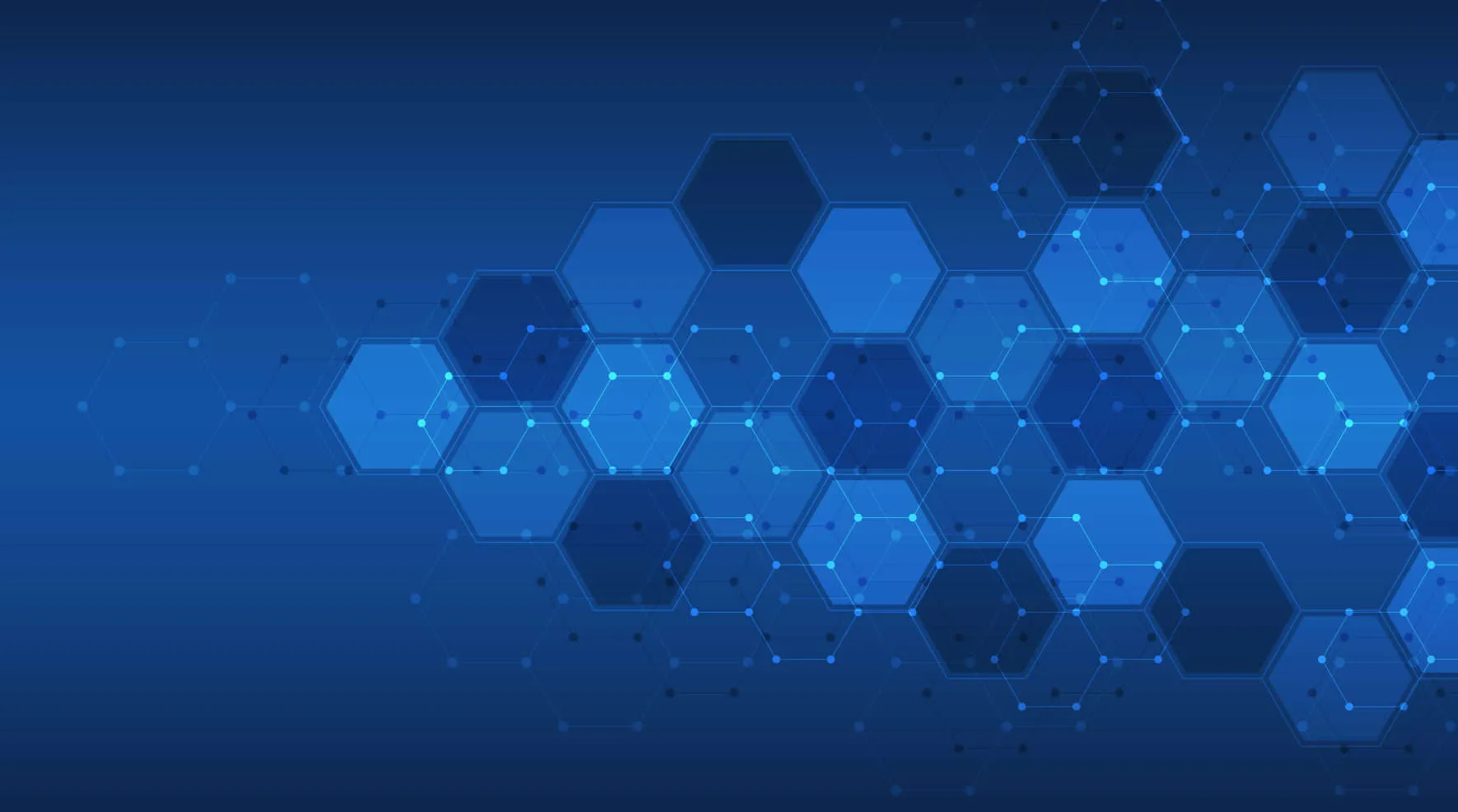 Blue hexagons loosely scattered across a dark background